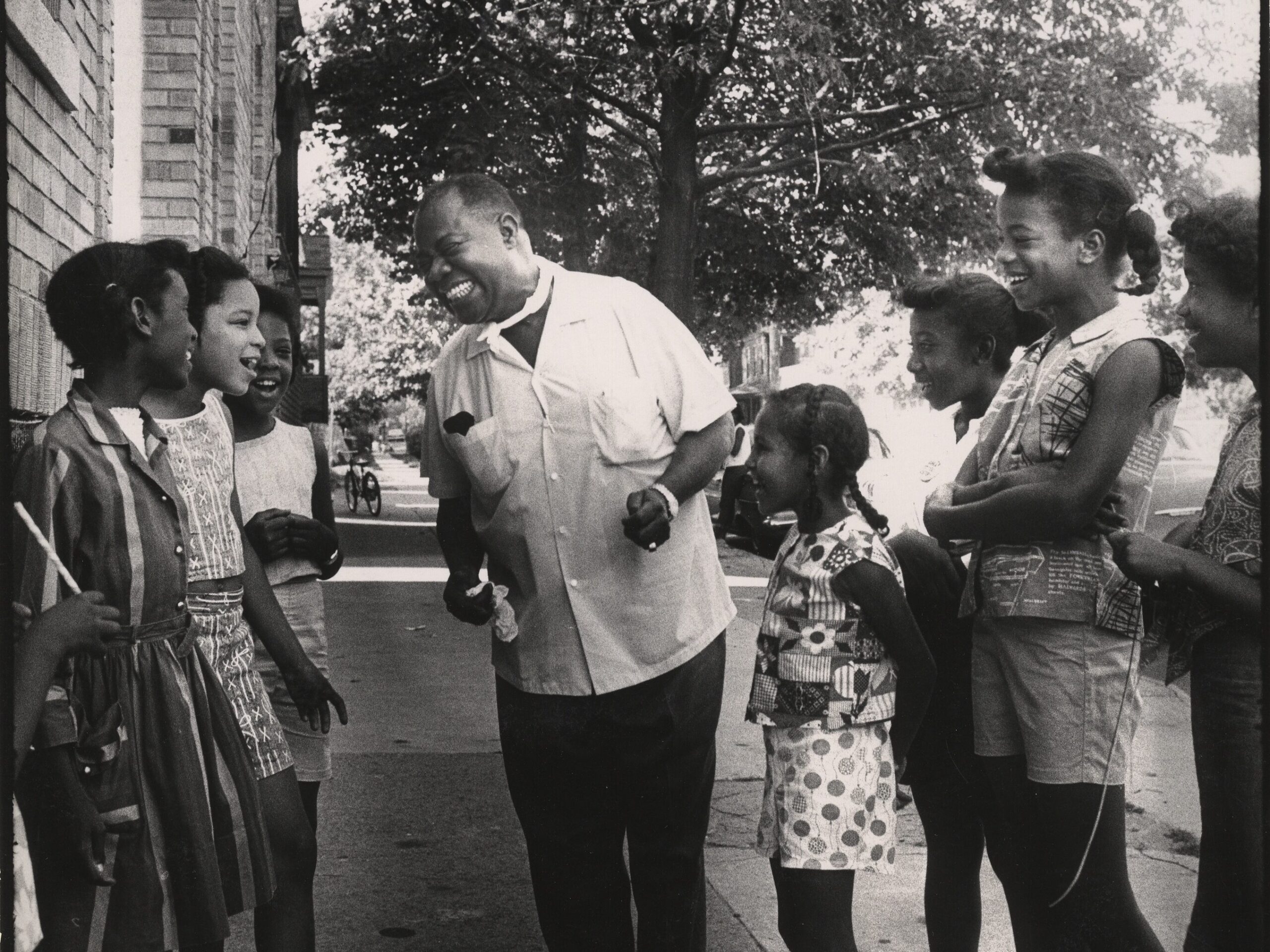 To neighbors in his Corona, Queens, New York City neighborhood Louis Armstrong was a familiar presence on the block